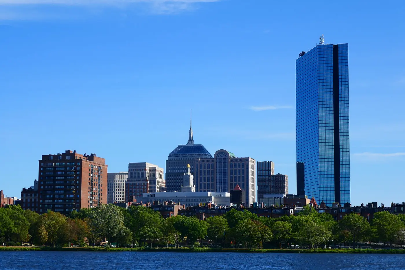 Back Bay skyline across the Charles River, with residential buildings in front of office towers