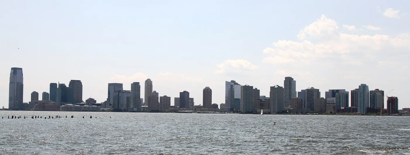 Condo insurance New Jersey: residential towers along the Jersey City Hudson River waterfront