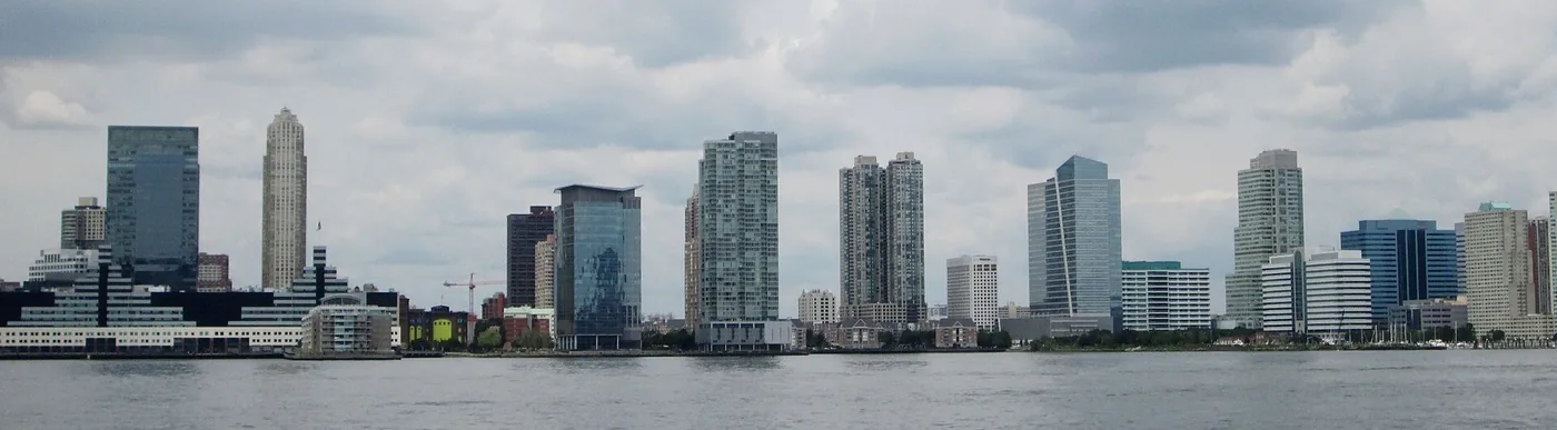 Residential high-rises on the Jersey City waterfront, seen across the Hudson River