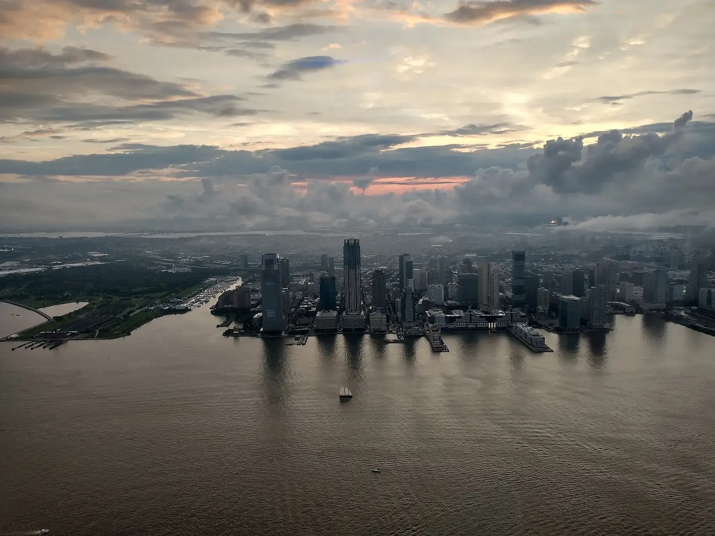 Jersey City waterfront towers at Exchange Place along the Hudson River at sunset, seen from above